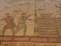 Piazza Armerina (villa Romana del Casale), ambulatory of the great hunt, sailing and hunting scenes Stock Footage