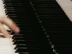 CU TD PAN Woman playing piano / Dresden, Saxony, Germany Stock Footage