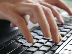 Dolly shot of Girl Typing at Keyboard,Close up Stock Footage