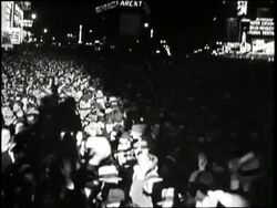 A crowd in Times Square celebrates the re-election of U.S. President Franklin D. Roosevelt. News Clip