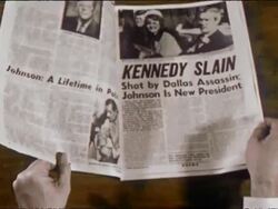 1964 close up hands turning pages of special New York Newsday edition of Kennedy assassination / Long Island, New York / AUDIO Stock Footage