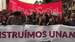 VOICED : Estudiantes marchan en Chile para exigir condonacion de deudas News Clip