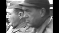 Military officers on ship talking and communicating information during WW II News Clip