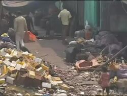 Giant water pipe and piles of rubbish in Mumbai, India Stock Footage