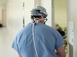 Doctor enters in an operating room Stock Footage