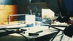 Welding two steel tubes in slo mo. Stock Footage