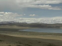 Time Lapse Shadow of clouds passing over Mansarovar Lake Lhasa Tibet China Stock Footage