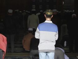 LS Muslim men praying in mosque/xian,shaanxi,China Stock Footage