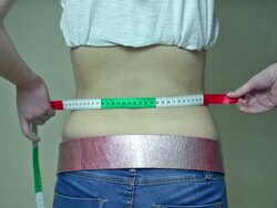 young woman, measure, pants with American flag design. Stock Footage