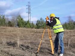 Land surveyor on construction site Stock Footage