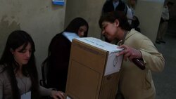 VOICED : Argentinos acuden a las urnas News Clip