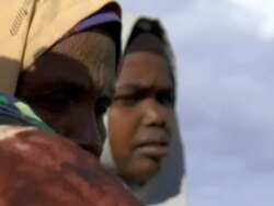 Old women drinking water from watre bottle Stock Footage