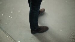 A young man paces impatiently. Stock Footage