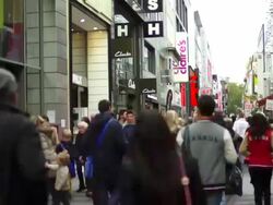 T/L PAN People Rushing on the Shopping Street Stock Footage