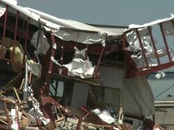 Destruction in Kesennuma City, a traditional fishing town in N E Japan filmed on 1 April 2011, 3 weeks after a tsunami which was caused by magnitude 9 Tohoku earthquake off north east Japan / AUDIO Stock Footage