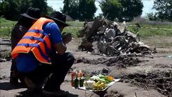 CLEAN : Families mourn Laos air disaster victims News Clip