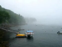 WA T/L sea fog, boats moving with tide, day to night, Maine, USA Stock Footage