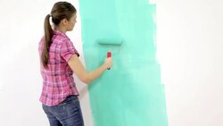 Pretty woman painting Stock Footage