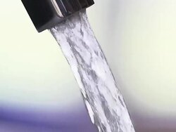 CU Shot of tap with running water / Vieux Pont en Auge, Normandy, France Stock Footage