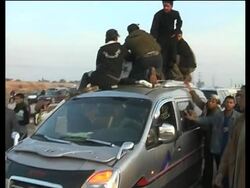 Funeral procession and pilgrims making their way to Karbala News Clip