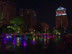 WS Childrens playing with fountain in park at night / St Louis, Missouri, United States Stock Footage