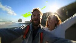 Young couple traveling take selfie on beach Stock Footage