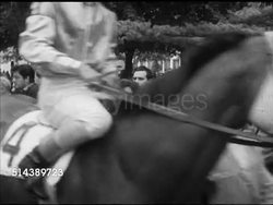 1953: HORSES TO TRACK: VS Outrider in riding jacket leading horses past spectators toward track, jockey Ted Atkinson on Greentree Stable 'Hoodwink' (#2), brief glimpses (#4). VS Racehorses arriving at track, XHA TD WS Thoroughbreds & jockeys onto track. Instructional Video