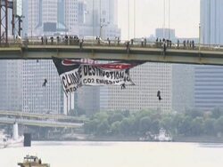 CLEAN: Climate: Greenpeace hangs banner from Pittsburgh bridge News Clip