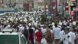 CLEAN : Thousands of white clad Amsterdammers march for MH17 News Clip