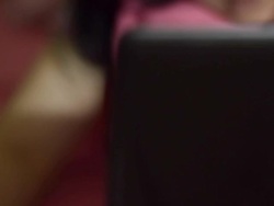 woman is talking while using notebook Stock Footage