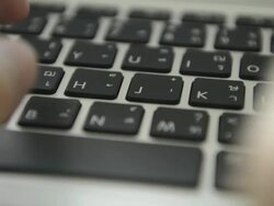 Typing On Laptop Keyboard Stock Footage