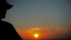 Dumbbell Curling Exercise on Summit at Sunset Stock Footage