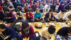 Worshippers inside Jogyesa Temple, Jongno-gu district, Seoul, South Korea, Asia Stock Footage