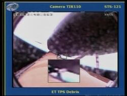 Astronauts inspect Discovery for damage, briefing News Clip