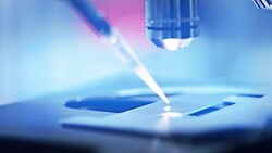 Scientist using microscope in laboratory, Slow motion Stock Footage