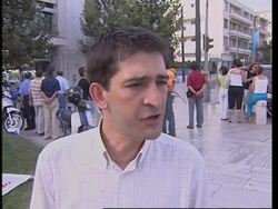 Workers protest for better pay and Olympic bonus News Clip