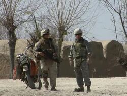 WS Soldiers standing with tents in background / Mausa Qala, Helmand Province, Afghanistan. Stock Footage