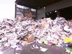 Machinery operates at a paper recycling center in New York City. Stock Footage