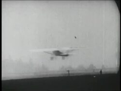 B/W 1927 PAN Spirit of St. Louis airplane taking off from ground in NY Stock Footage