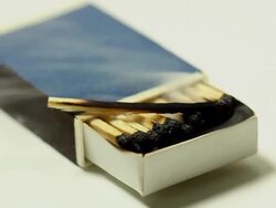 Matchbox burning Stock Footage