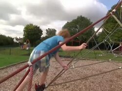 Young Boy Using Climbing Frame News Clip