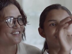 CU School teacher assisting children in science lab Stock Footage