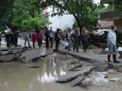 people walking in the mud after a massive flooding in Varna, Bulgaria Stock Footage