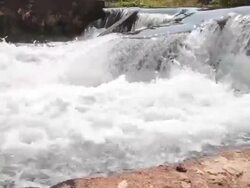 Dolly:Water flowing down from the dam. Stock Footage