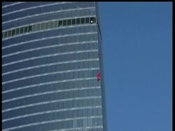 Alain Robert, a French skyscraper climber, goes up the 799-foot Federation office building in Moscow. It took him less than half an hour. After the climb, police detained Robert. Organizers say they got the necessary approvals for the ascent. News Clip