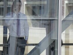 MS Young businessman talking  on cell phone / Minneapolis, Minnesota, United States Stock Footage