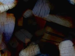 PILE OF WOOD - expanding flow to the corners. (loop) Stock Footage