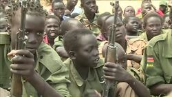 CLEAN : S Sudan child soldiers surrender weapons in official ceremony News Clip