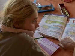 CU Mother helping girl doing school work at home / San Pedro de Atacama, Norte Grande, Chile Stock Footage