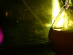 Beakers - Pan L-R ECU Slow Motion Stock Footage